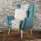Fauteuil d'appoint dossier haut à oreilles, capitonné, accoudoirs évasés, pieds en bois d'hévéa