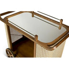 Desserte de bar moderne avec plateau miroir, étagères en cannage, poignée en cuir et roulettes