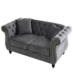 Canapé causeuse Chesterfield en velours, accoudoirs arrondis, clous décoratifs, structure en bois massif