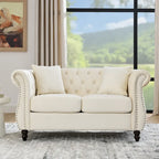 Canapé causeuse Chesterfield en velours, accoudoirs arrondis, clous décoratifs, structure en bois massif