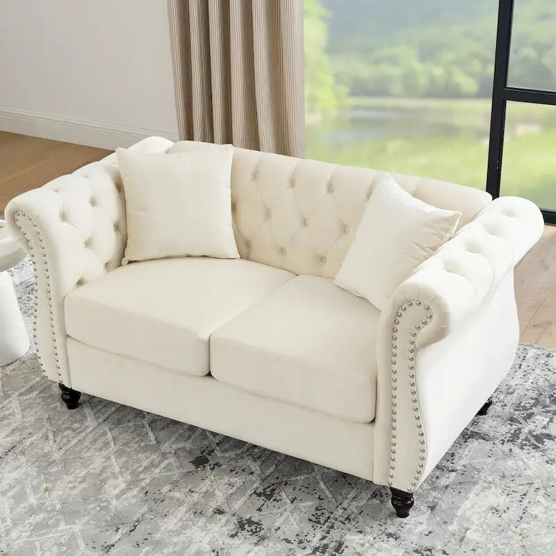 Canapé causeuse Chesterfield en velours, accoudoirs arrondis, clous décoratifs, structure en bois massif