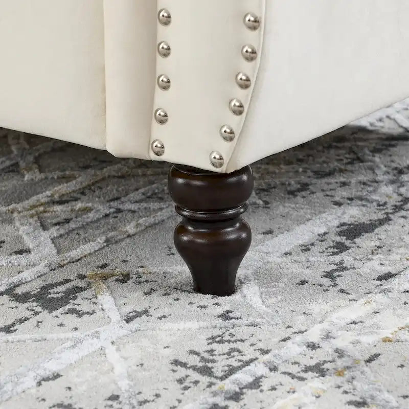 Canapé causeuse Chesterfield en velours, accoudoirs arrondis, clous décoratifs, structure en bois massif