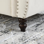 Canapé causeuse Chesterfield en velours, accoudoirs arrondis, clous décoratifs, structure en bois massif