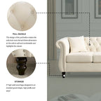 Canapé 3 places Chesterfield en velours beige, accoudoirs arrondis, garniture cloutée, structure en bois